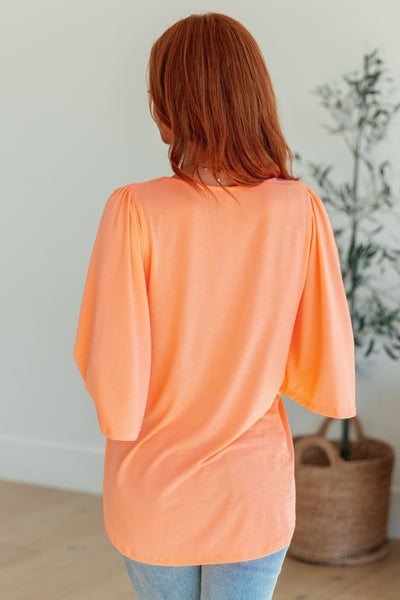 Wrinkle Free Flare Sleeve Top in Neon Orange
