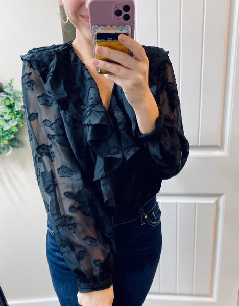 Think Of Me Ruffle Long Sleeve Bodysuit in Black