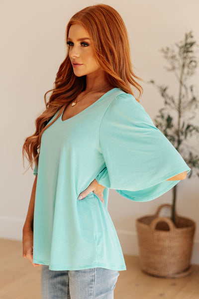 Wrinkle Free Flare Sleeve Top in Neon Blue