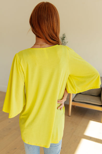 Wrinkle Free Flare Sleeve Top in Neon Yellow