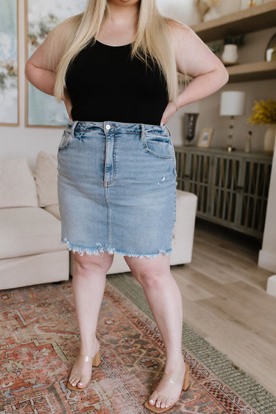 Risen Lightwash Raw Hem Denim Skirt